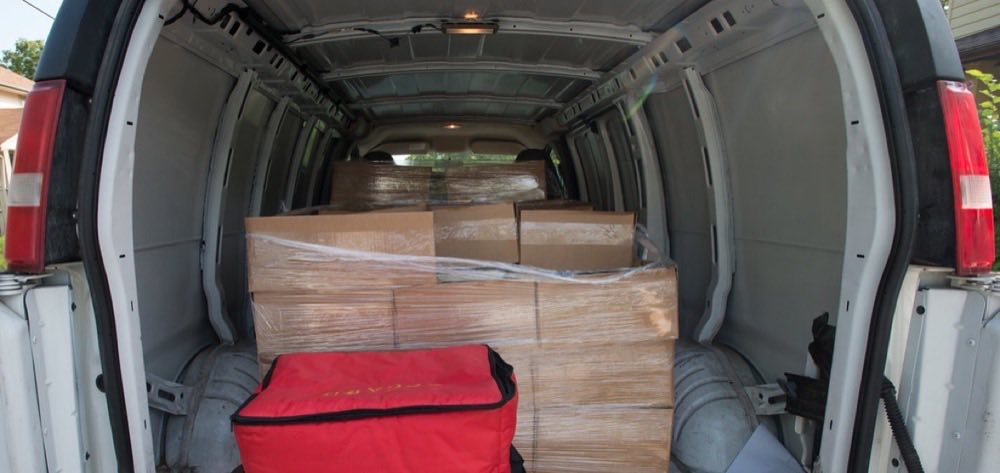 Packages loaded in the back of a delivery van